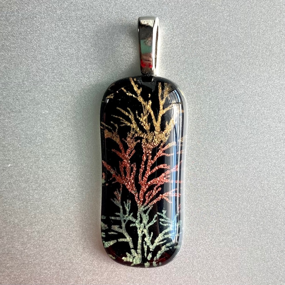 Unique glass pendant resembling tree branch